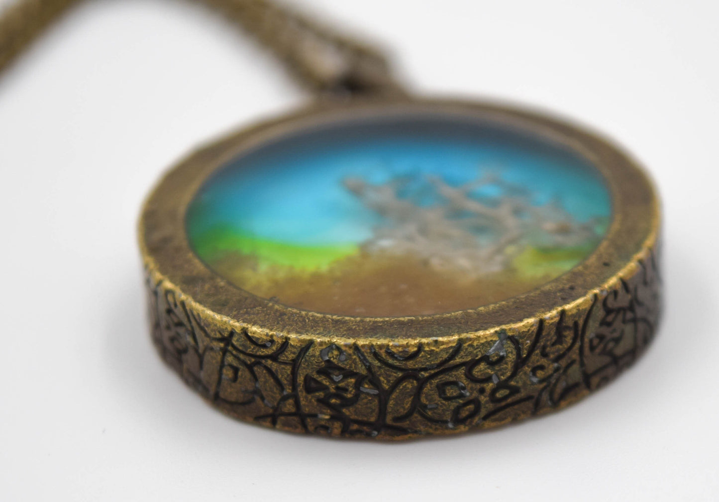 Resin landscape pendant, antique bronze, organic jewelry with real mosses and sand of the Sahara desert, botanical jewelry, inclusions