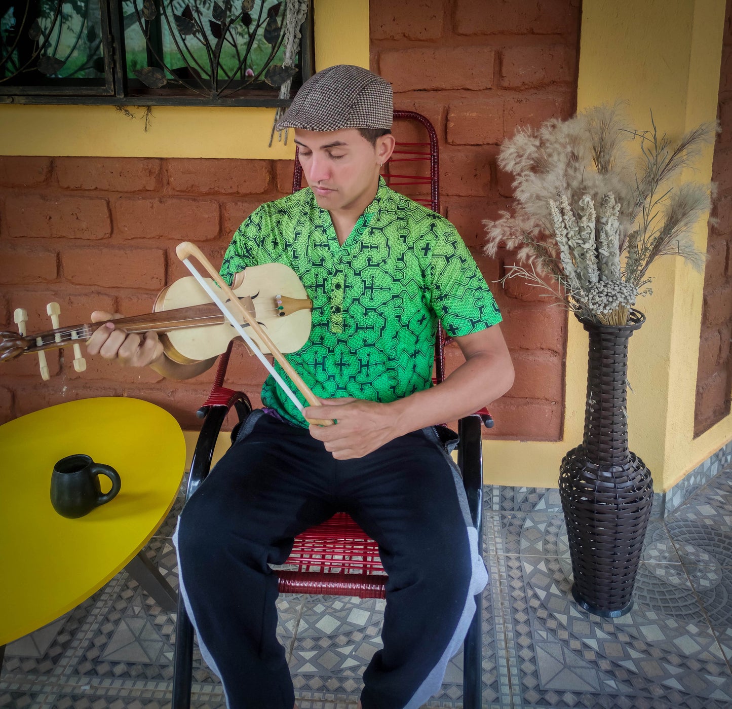 100% cotton green t-shirt featuring mesmerizing Sacred Geometry Shipibo art – where comfort meets mysticism."